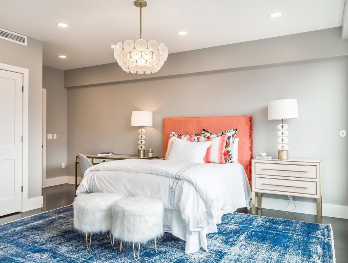 Bedroom with coral headboard